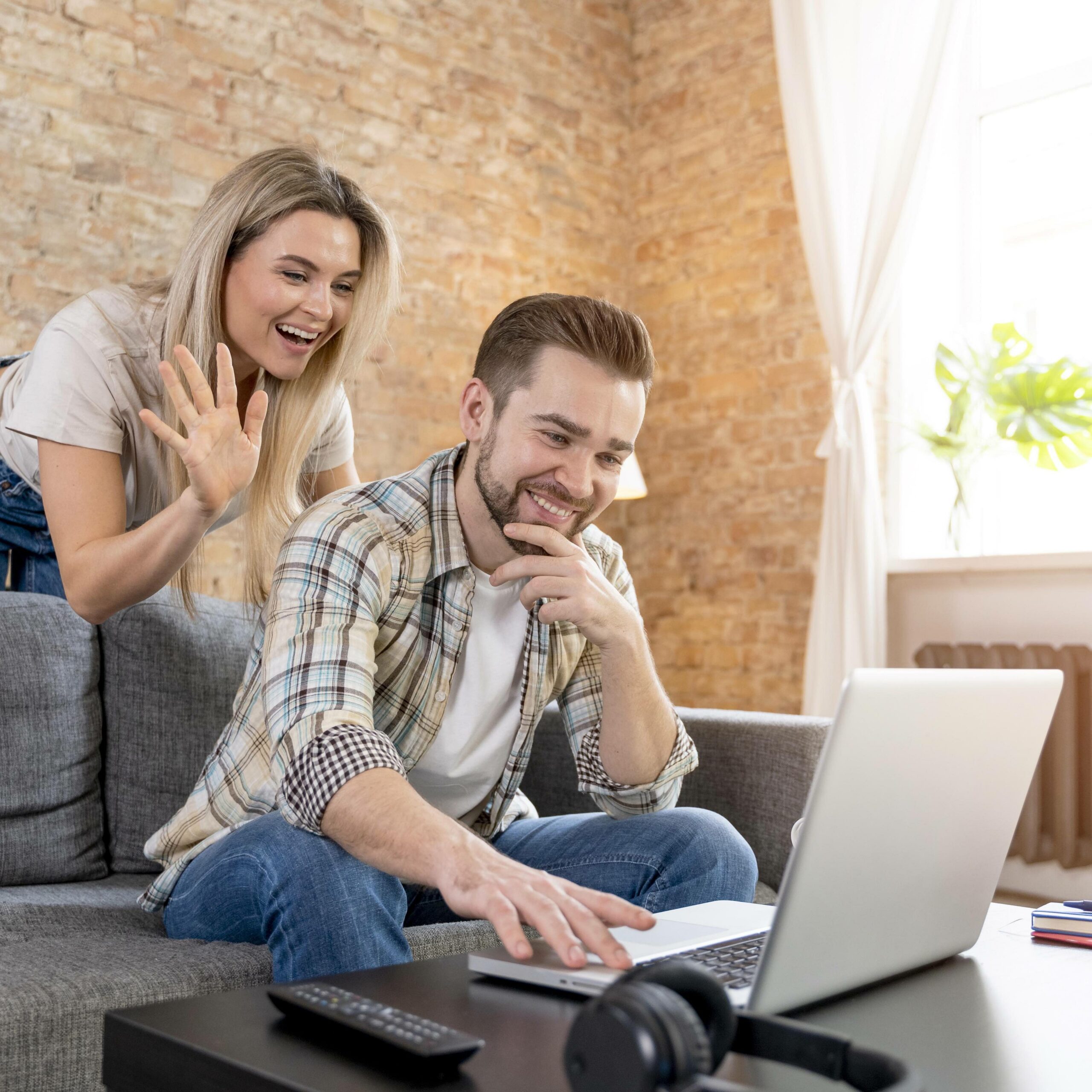 couple-home-having-videocall-with-family